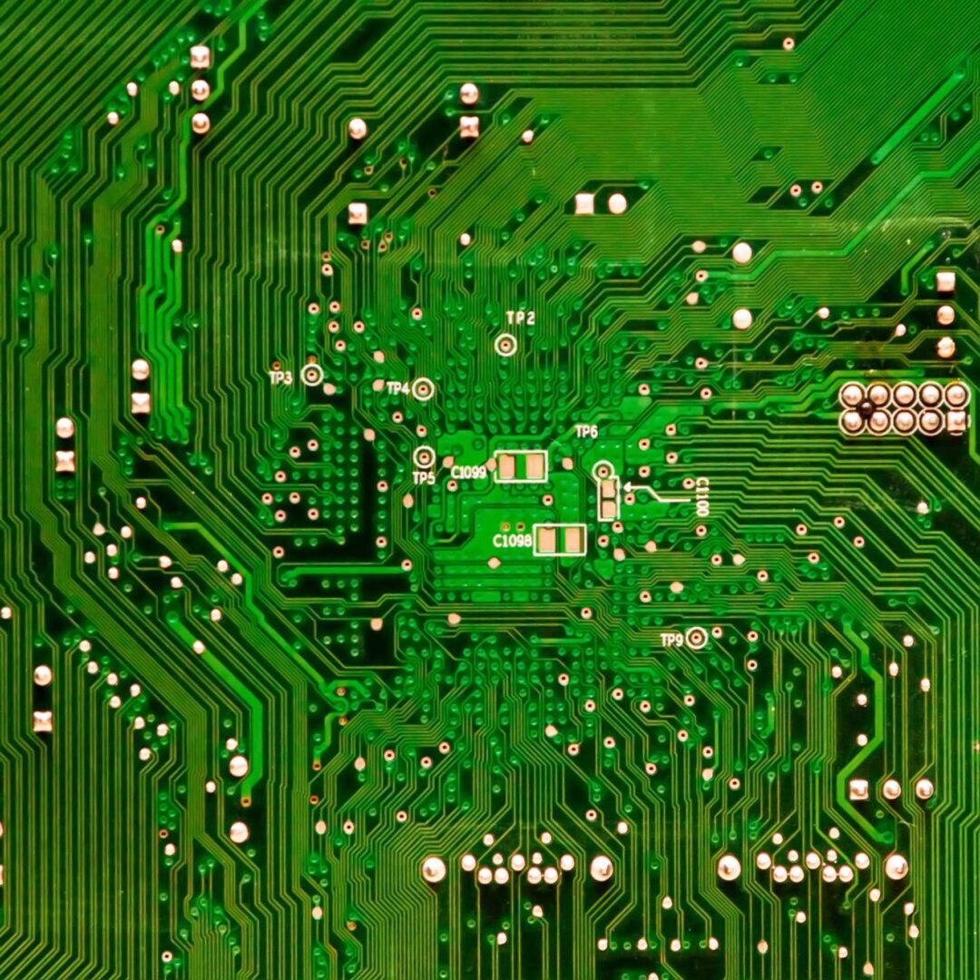 A close up of the circuit board of an electronic device.