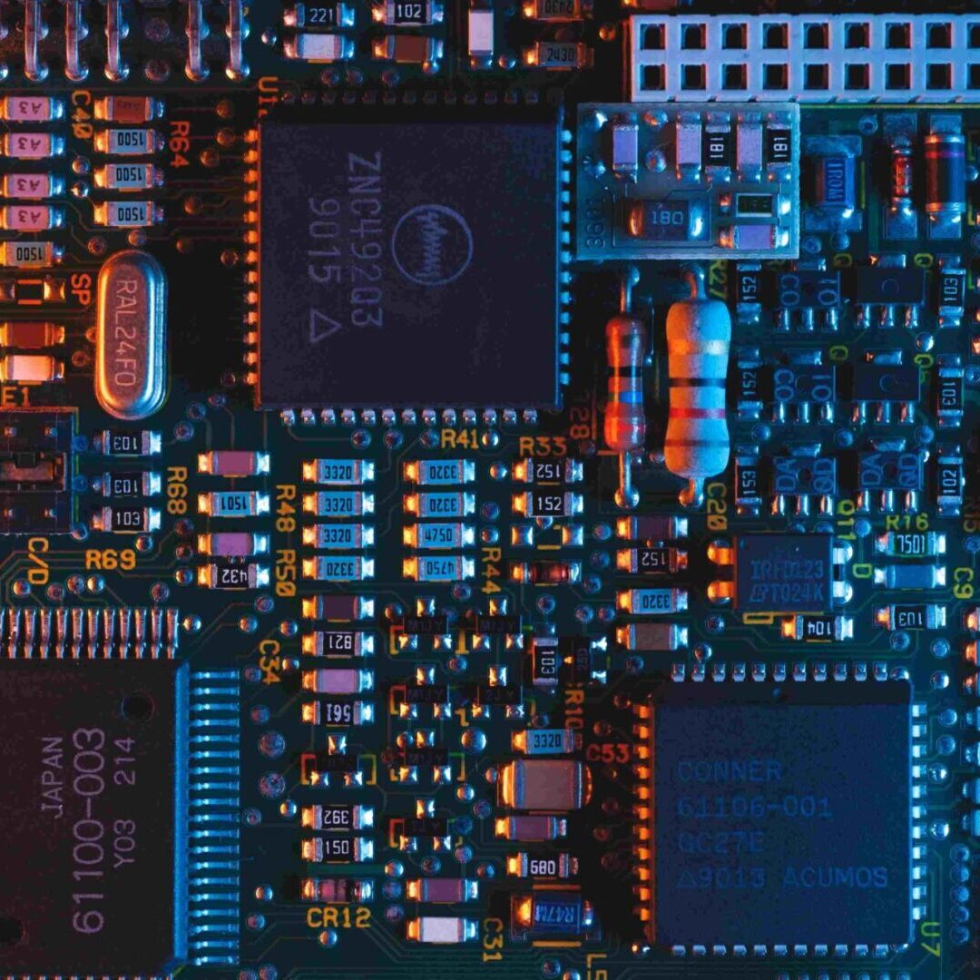 A close up of some electronic components on a circuit board